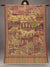 Golden artistic Kani Pashmina scenery shawl with palaces, gardens, people and animals, fully open on a wooden rod in a grey studio | Taj Mehal Handicrafts