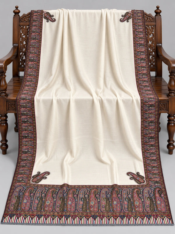 Ivory Kani Moonlight shawl with multicolour paisley border displayed open on a studio bench — Taj Mehal Handicrafts