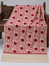 Ivory pashmina wool shawl with maroon Aari vine embroidery and velvet floral accents, 2.7 yards, displayed on a wooden bench | Taj Mehal Handicrafts