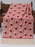 Ivory pashmina wool shawl with maroon Aari vine embroidery and velvet floral accents, 2.7 yards, displayed on a wooden bench | Taj Mehal Handicrafts