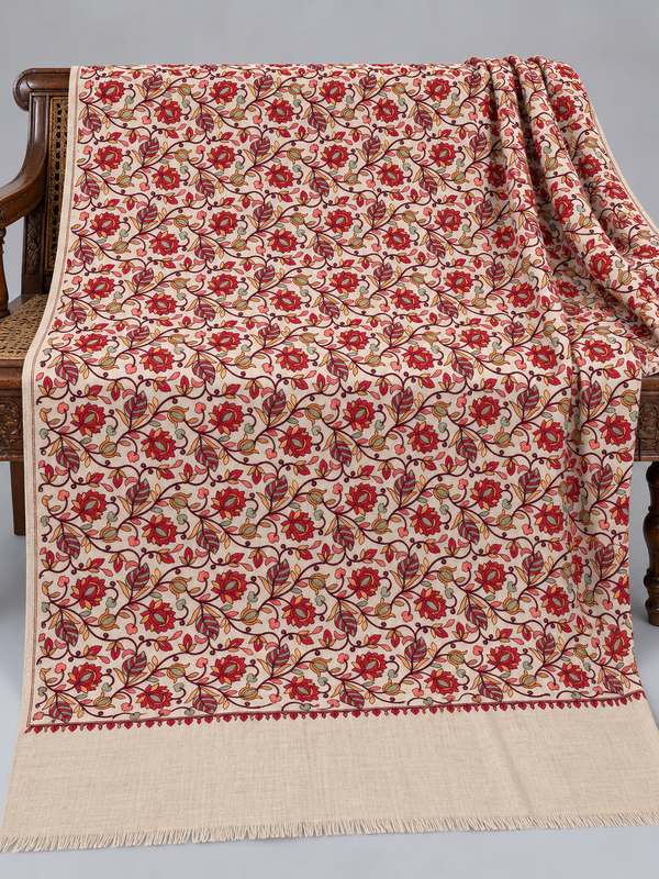 Ivory Kashmina winter shawl with red rose embroidery and green leaf accents, 2.75 yards, displayed on a wooden bench | Taj Mehal Handicrafts