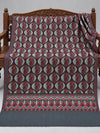 Dark green-toned Fine Aari work shawl with silver-grey paisley details and colourful floral borders, 2.75 yards, displayed on a wooden bench | Taj Mehal Handicrafts