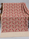 Ivory Kashmina winter shawl with red rose embroidery and green leaf accents, 2.75 yards, displayed on a wooden bench | Taj Mehal Handicrafts