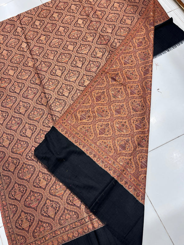 Close-up of Moonlight Kani reversible Matka shawl motifs and border in rust, brown and black, Taj Mehal Handicrafts
