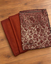 Rust plain shirt and trouser fabric with a Moonlight floral paisley shawl