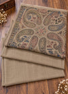Taupe brown beige multicolor paisley three piece suit folded on wooden floor Taj Mehal Handicrafts Islamabad