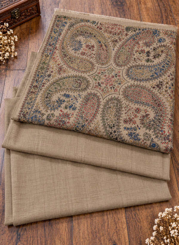Taupe brown beige multicolor paisley three piece suit folded on wooden floor Taj Mehal Handicrafts Islamabad