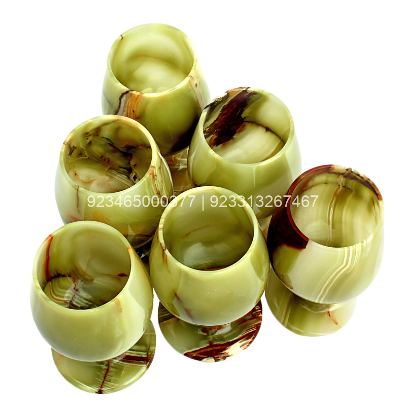 This is a set item. There are total 6 Green onyx stone wine glasses in a set. Each of theses clear Green Onyx Stone Wine Glasses have a length of around 5 inches. These wine glasses are for practical as well as for home decor use. These Onyx Stone wine glasses are securely packed when shipped. Made in Pakistan